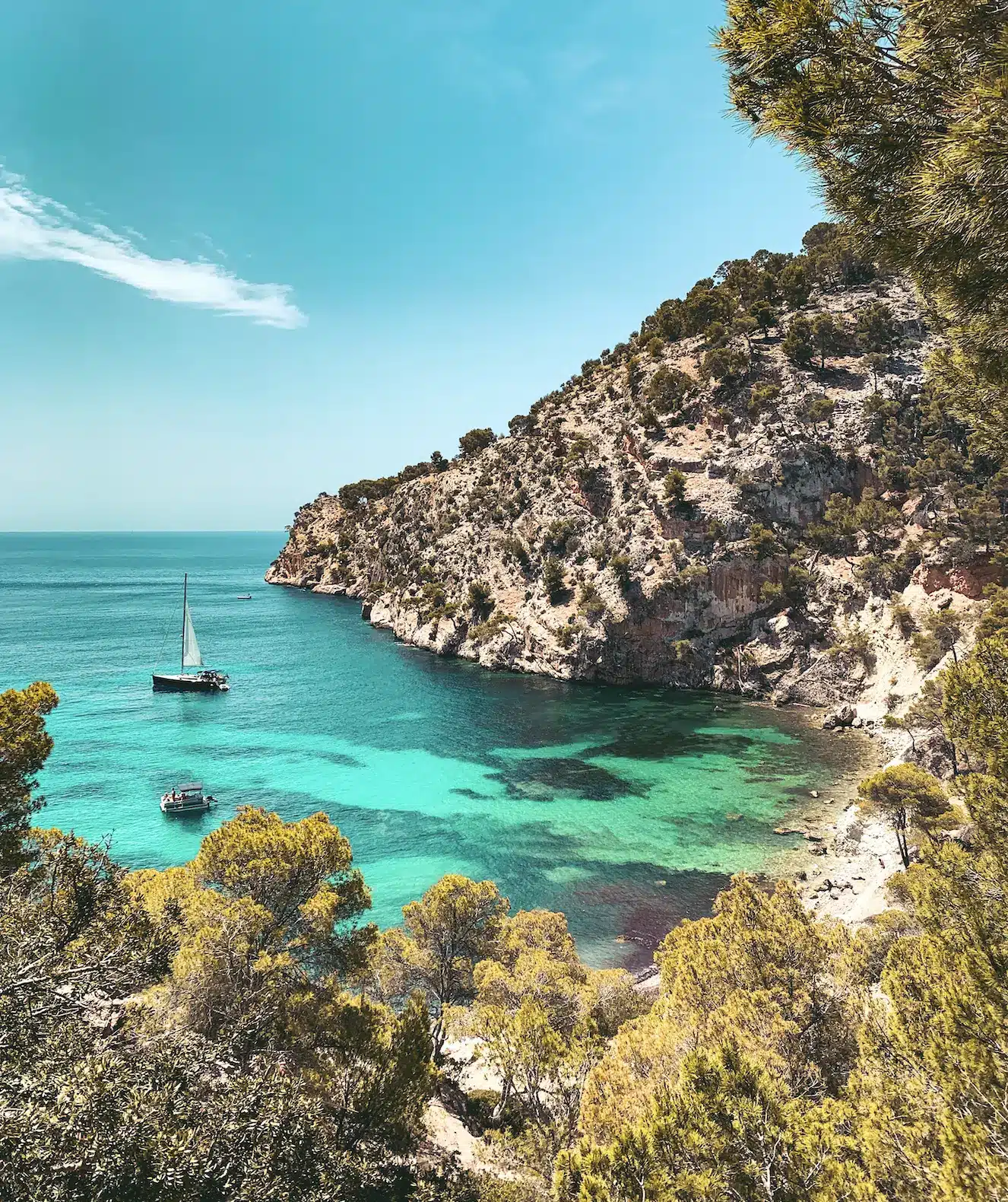 Majorca, Spain is a beautiful with beach resorts, sheltered coves and  limestone mountains.